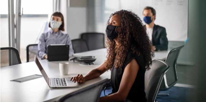 wearing masks during a meeting