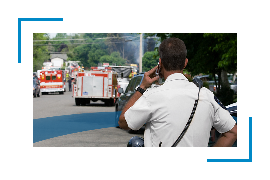 Back of a man looking at fire truck