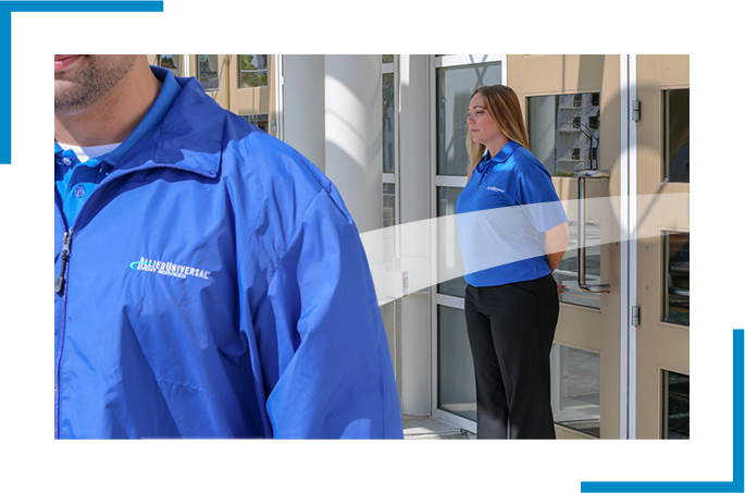 two An event security staff in allied universal blue uniform