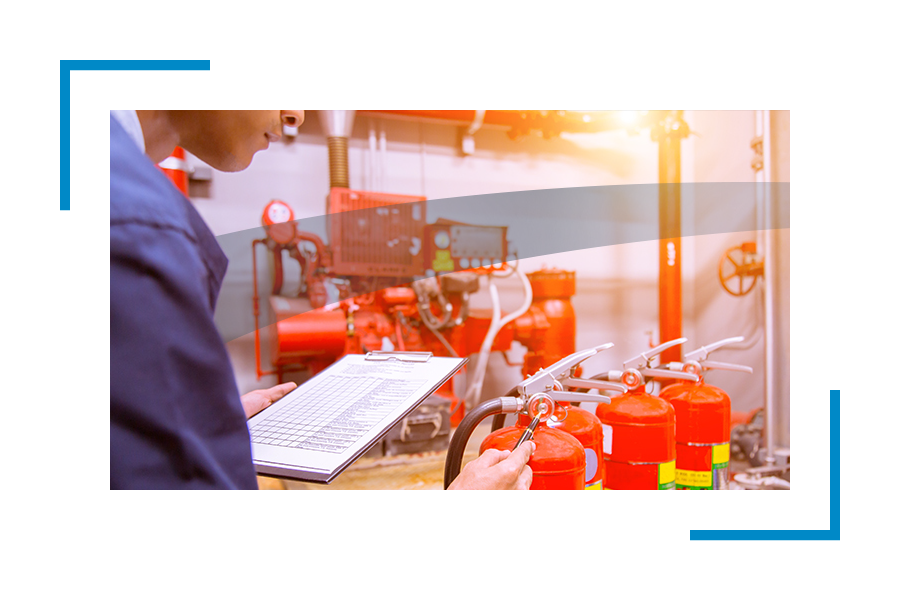 Man checking the fire extinguishers